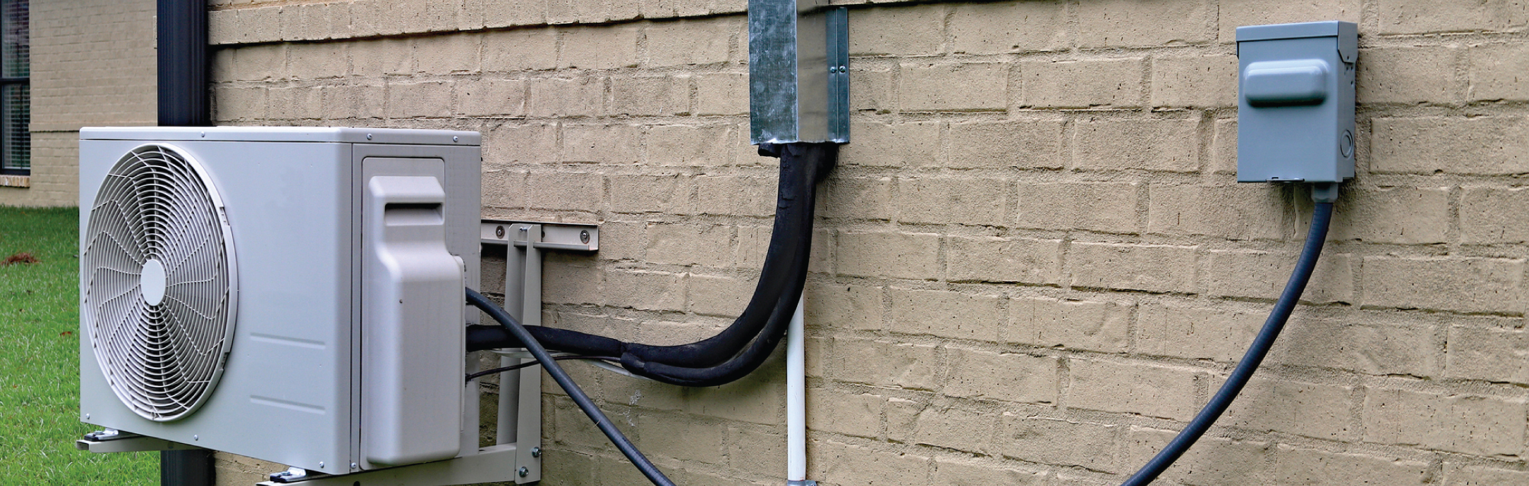 image of an HVAC unit outside a home