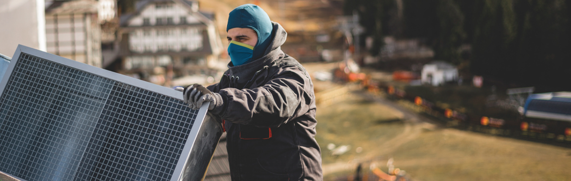 Image of HVAC tech working in the cold outside