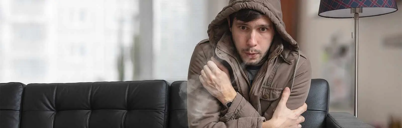 cold man on sofa 1600x509 1